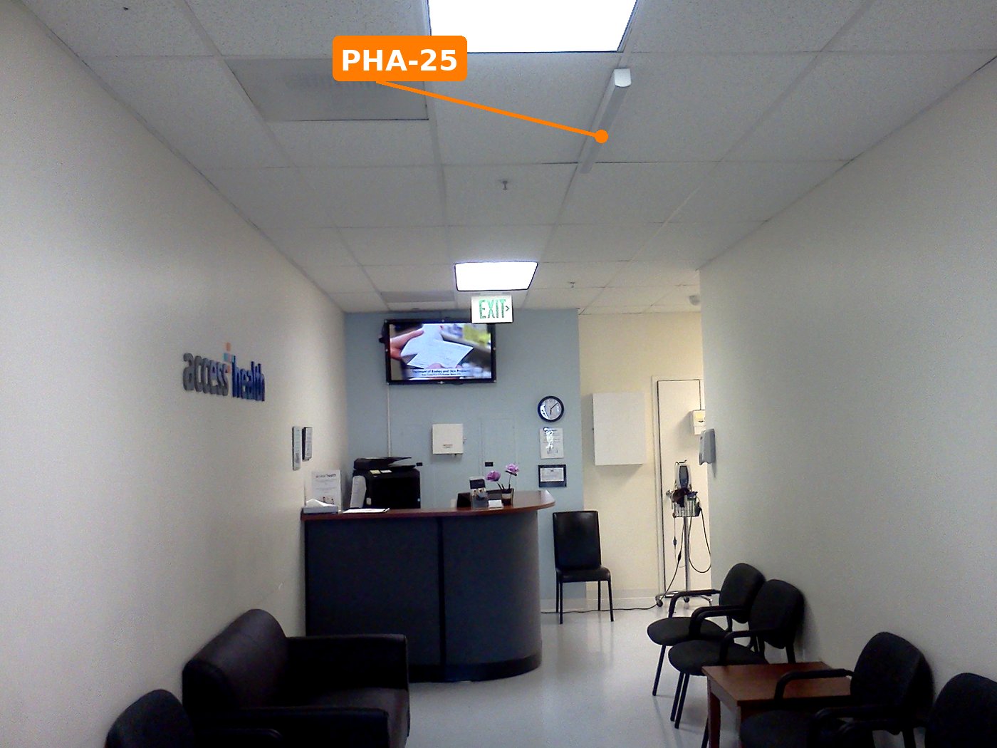The waiting area - PHA-25 overhead, signage display at the reception desk